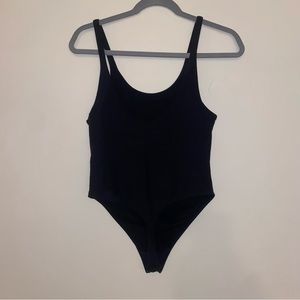 Black ribbed bodysuit with snaps